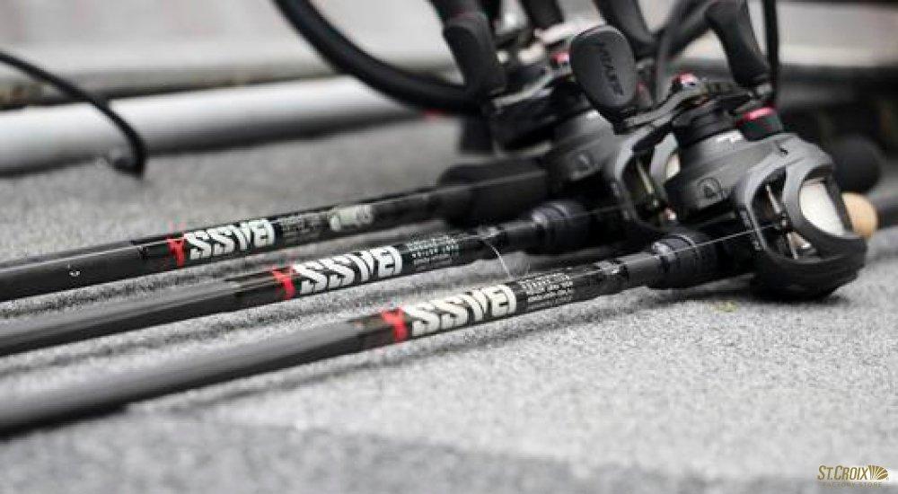 zoomed in image of three fishing rods and reels